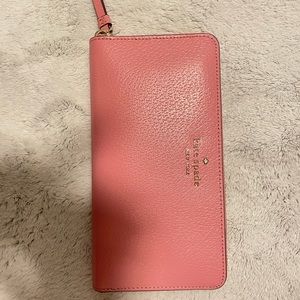 KATE SPADE PINK MULTI-POCKET WALLET.